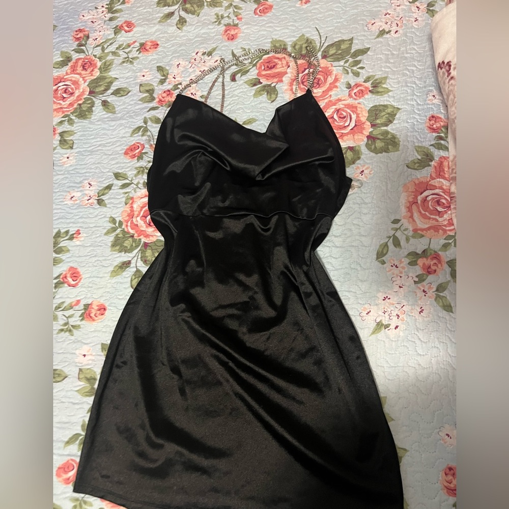Dress with shiny straps